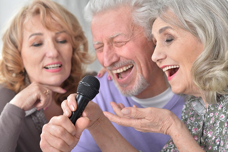 Senior-Enjoying-Karaoke